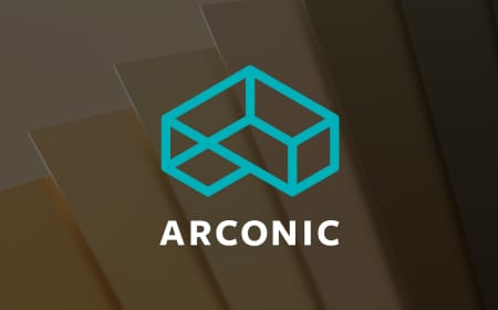 The image shows the Arconic logo, featuring a stylized turquoise geometric design resembling an open box, with "ARCONIC" written below in white capital letters. The background displays overlapping gradient panels transitioning from brown to black, reminiscent of break metal used in Exterior Facade Cladding.