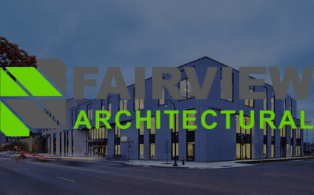 A modern, angular building is depicted with the text "Fairview Architectural" in large letters superimposed on it. The text is in gray and bright green, with a geometric pattern to the left. The image appears to be taken at dusk, highlighting the sleek design of the structure.