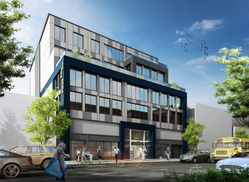 A modern, multistory building with a glass facade and blue accents. People walk along the sidewalk in front, and there are parked cars on the right. Trees and birds add greenery and life to the urban scene on this bright, clear day.